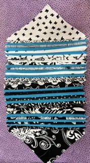 Stack of fabric strips in black, white, and teal for quilting – Looney Bin Quilting Stack of fabric strips in black, white, and teal for quilting - Looney Bin Quilting
